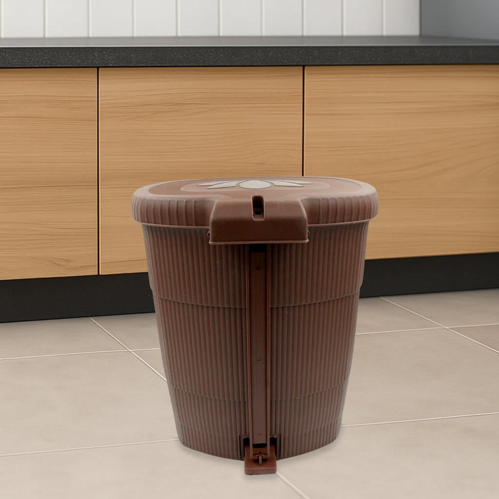 Side view of a white mini pedal dustbin, highlighting its convenient foot pedal.