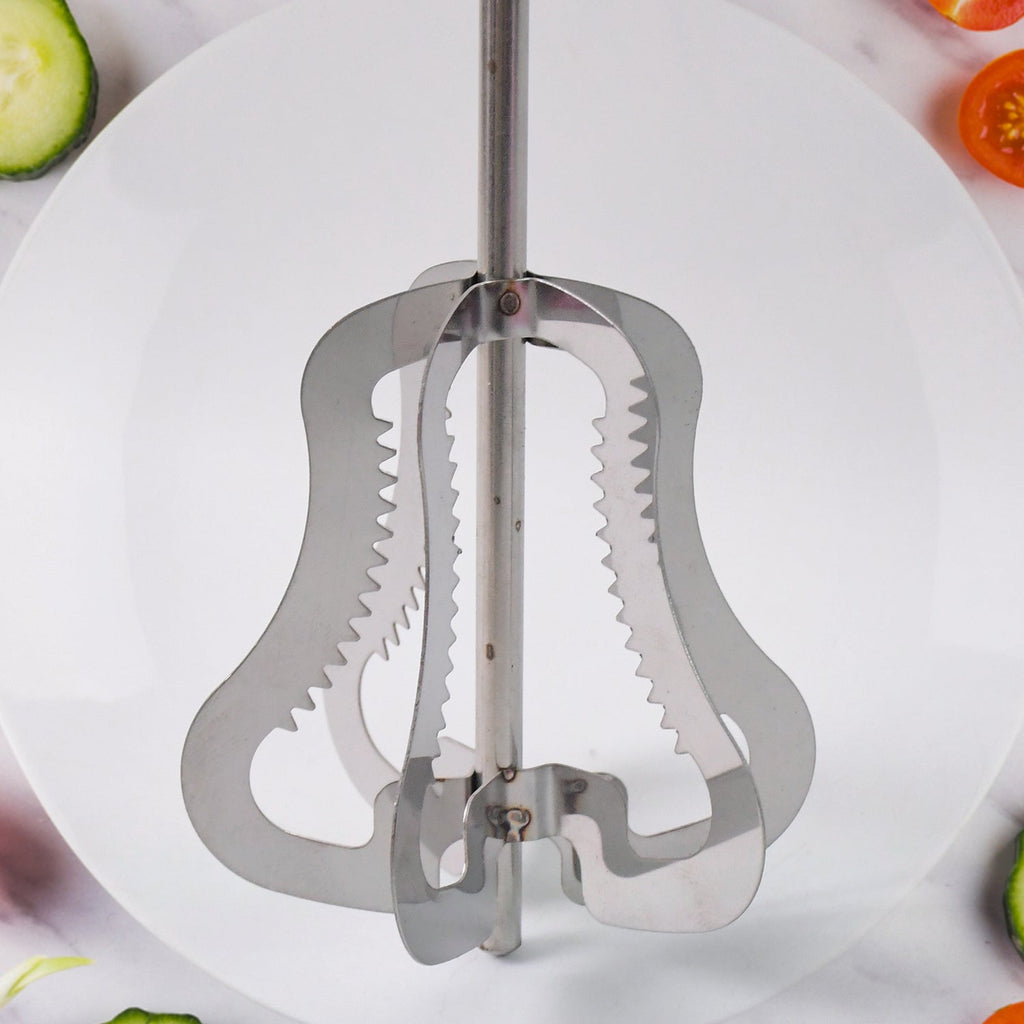 Efficient kitchen whisk with manual press mechanism for frothing