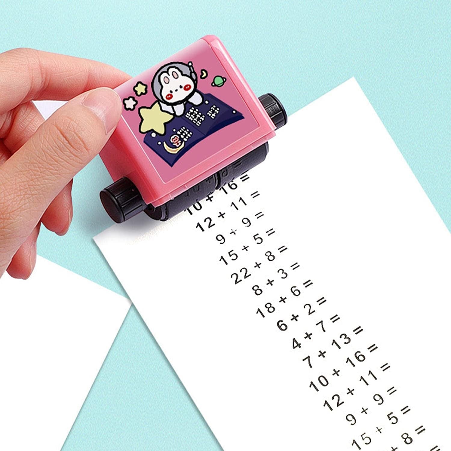 Addition and subtraction math roller stamp printing problems for kids.