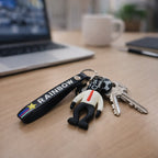 Playful football boy keychain with rainbow strap, attaches easily to keys and bags
