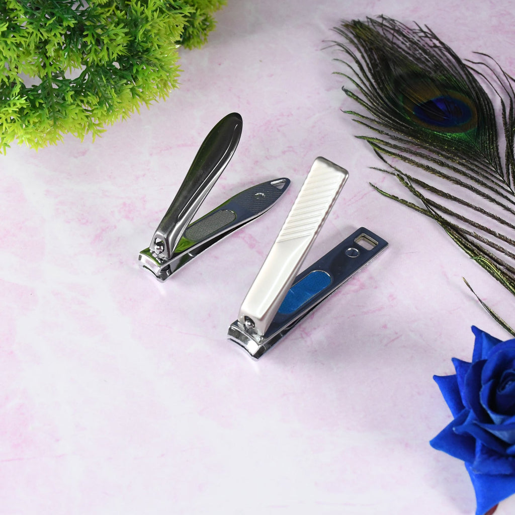 Compact stainless steel folding nail clippers in a closed position.