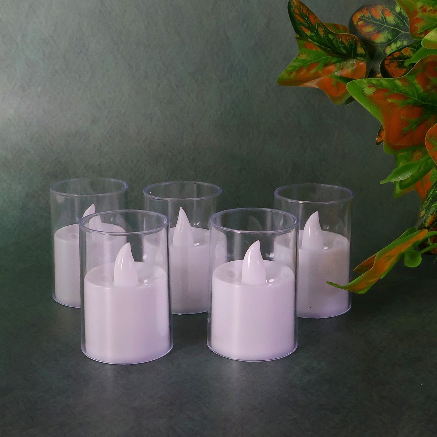 Close-up of a flameless LED votive candle with gentle flicker effect