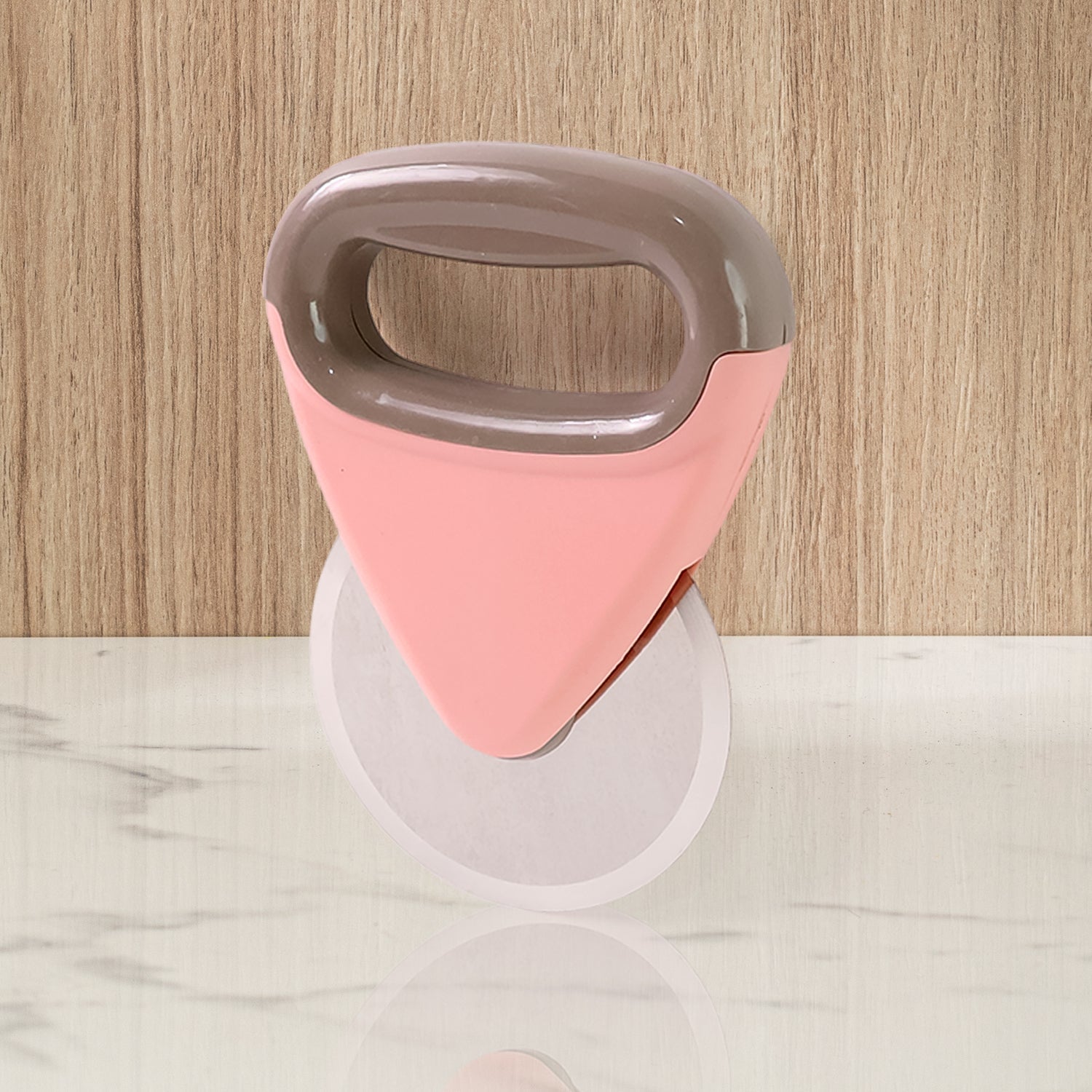 Top view of ergonomic pizza cutter showing stainless steel blade and handle