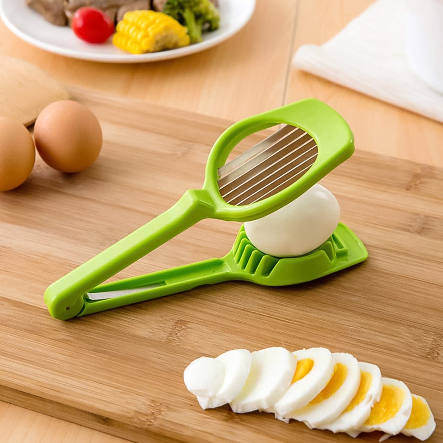 Close-up view of the Multipurpose Slicer efficiently dicing a boiled egg.