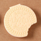 A round, light brown biscuit notebook with a realistic texture, featuring the Papezo logo.