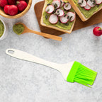 Close-up of silicone oil spatula brush handle and bristles for cooking