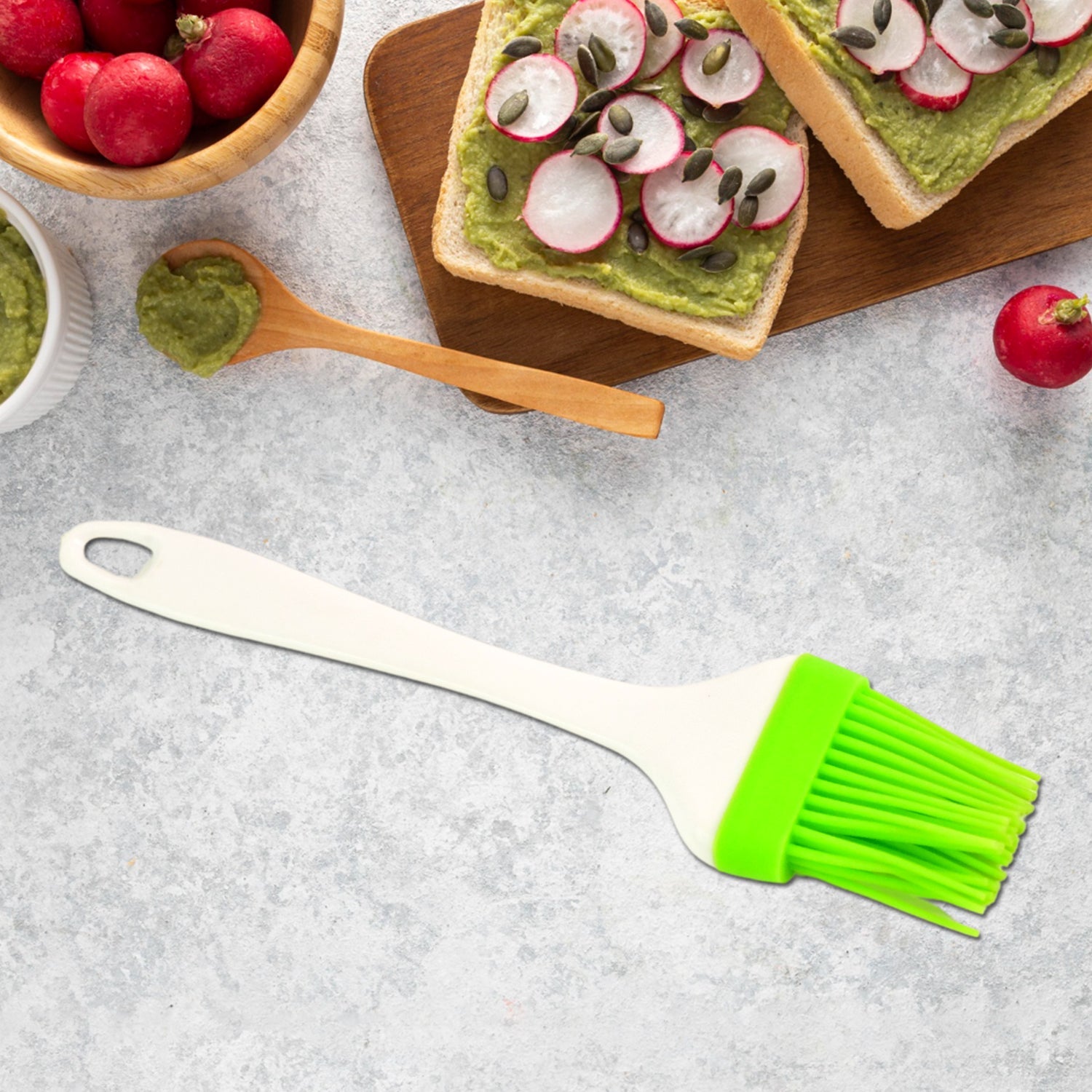 Close-up of silicone oil spatula brush handle and bristles for cooking