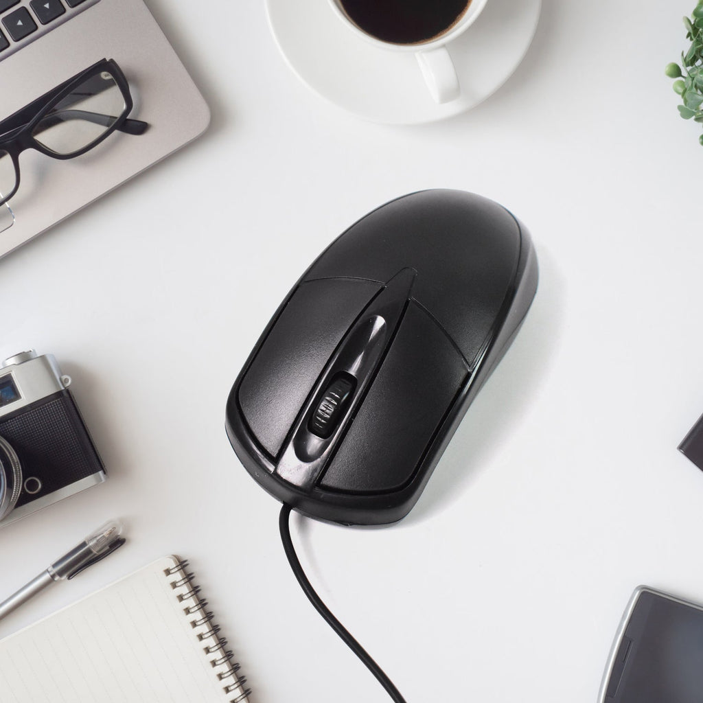 Top-down view of the black wired optical mouse, showcasing its simple and functional layout.