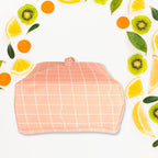 The compact, flat-folded design of the Foldable Food Cover for easy storage.