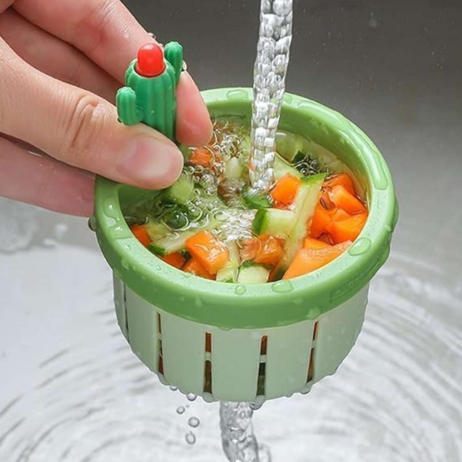 Close-up of the automatic press dumping basket of the sink drain strainer.