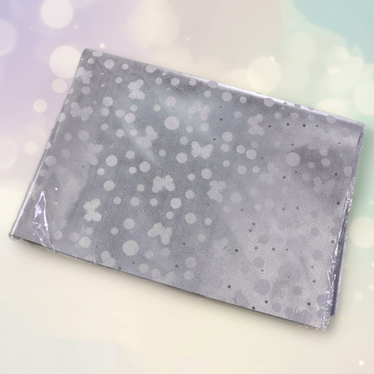 Single sheet of gift wrapping paper with butterfly pattern for gifts