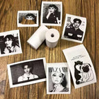 Close-up of a smooth, white thermal printer paper roll, highlighting its premium texture.