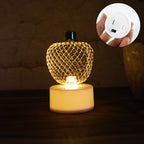 Battery-operated flameless apple tealight candles, safe for any occasion.
