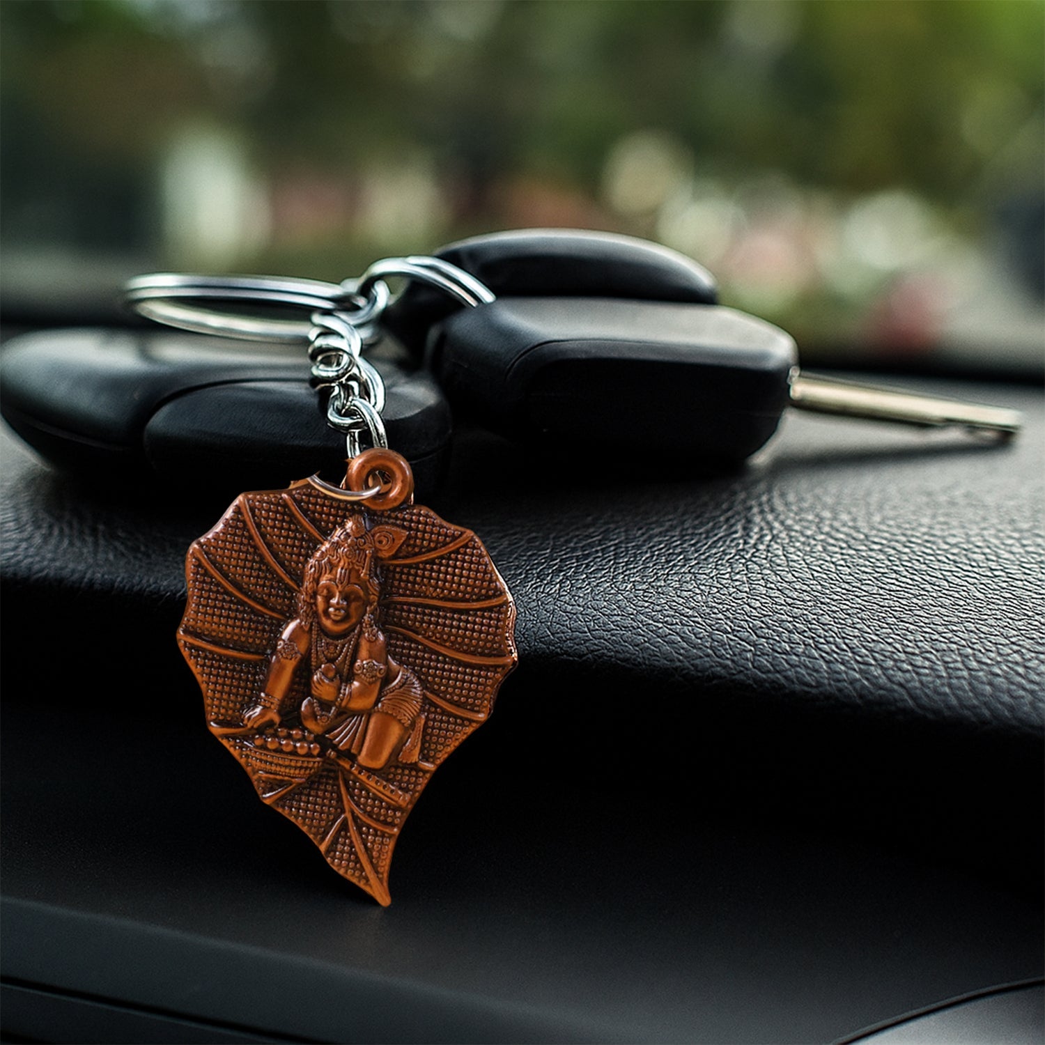 Sturdy metal ring attached to antique bronze Bal Krishna keychain