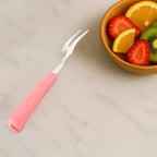 Pink handle detail on stainless steel mini fruit fork