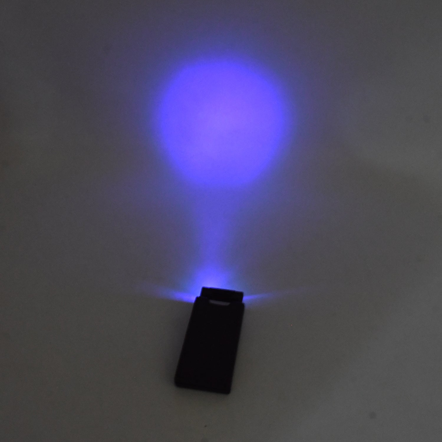 Extendable LED magnifier showing portable design with ergonomic handle