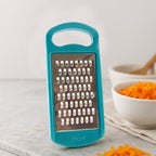 Side angle showing sharp stainless steel blade of Supermom multipurpose grater