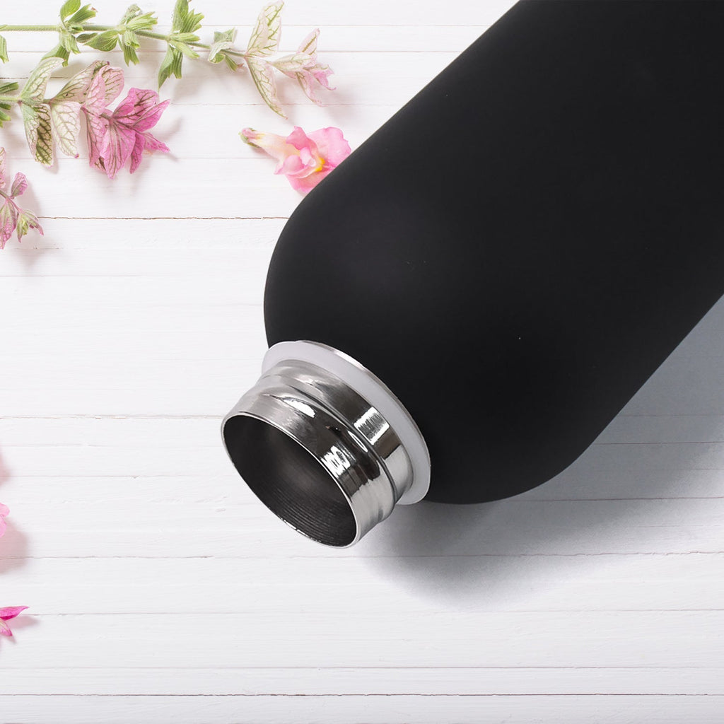 Closeup of stainless steel water bottle showing vacuum insulation design