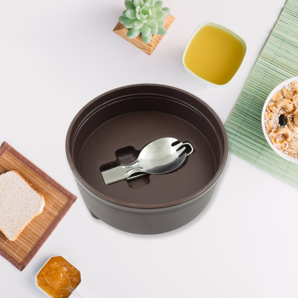 Top-down view of the leak-resistant tiffin with its secure lid and telescopic handle.