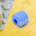 Blue jawline exerciser on a clean surface, ready for use.