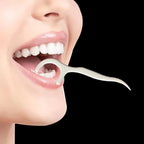 Hand holding a MintGuard Portable Dental Floss Pick, demonstrating ease of use for dental hygiene.
