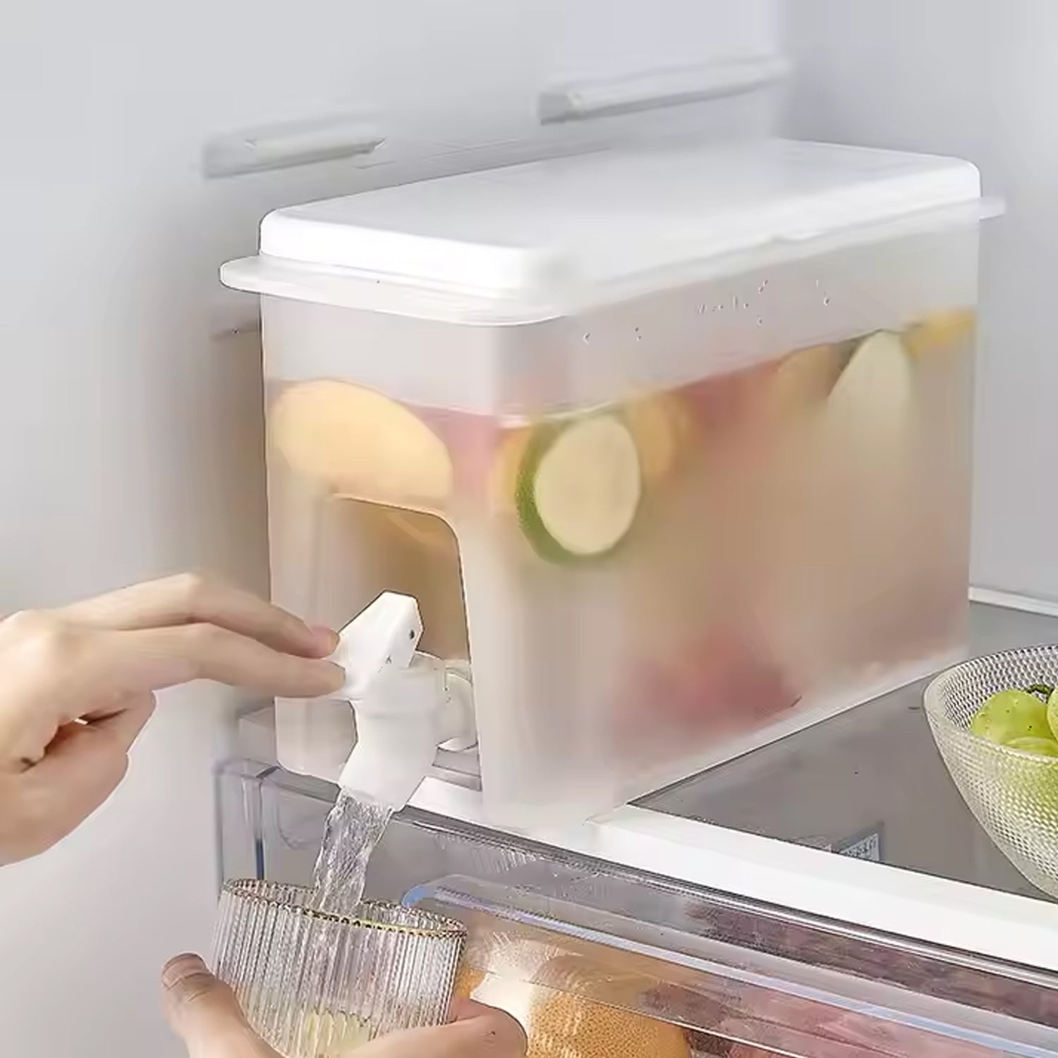 Clear plastic water dispenser jug filled with a vibrant beverage.