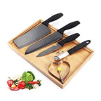 The sharp stainless steel chef knife, part of the 5-piece cutlery set.