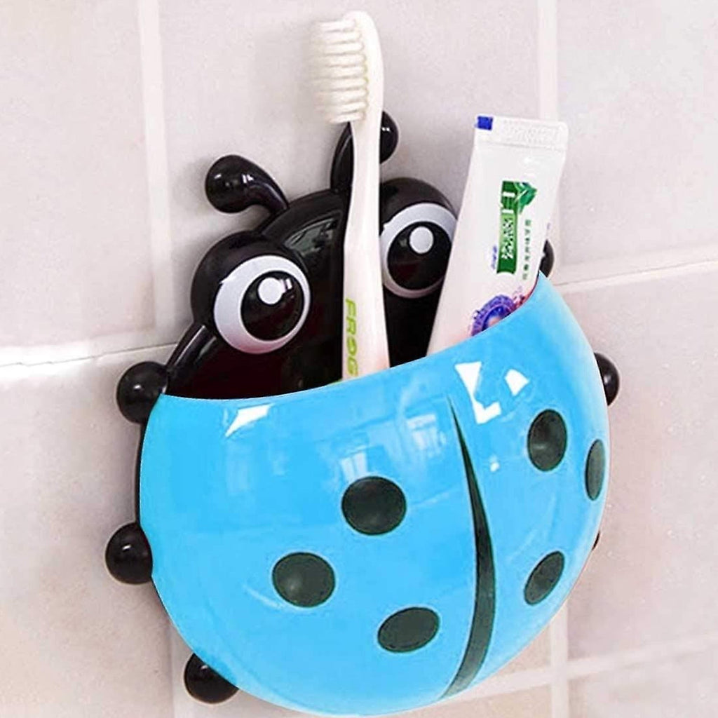 Ladybug toothbrush holder holding multiple toothbrushes for family use.