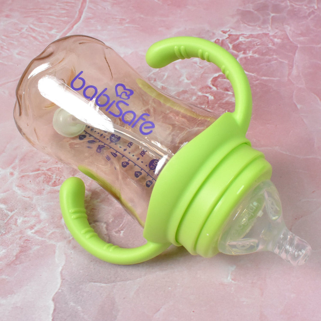 Close-up of the silicone nipple and weighted straw inside the Plastic Baby Feeding Bottle.