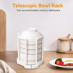 Close-up of the plastic kitchen bowl rack with air-drying dishes, showing drainage design.
