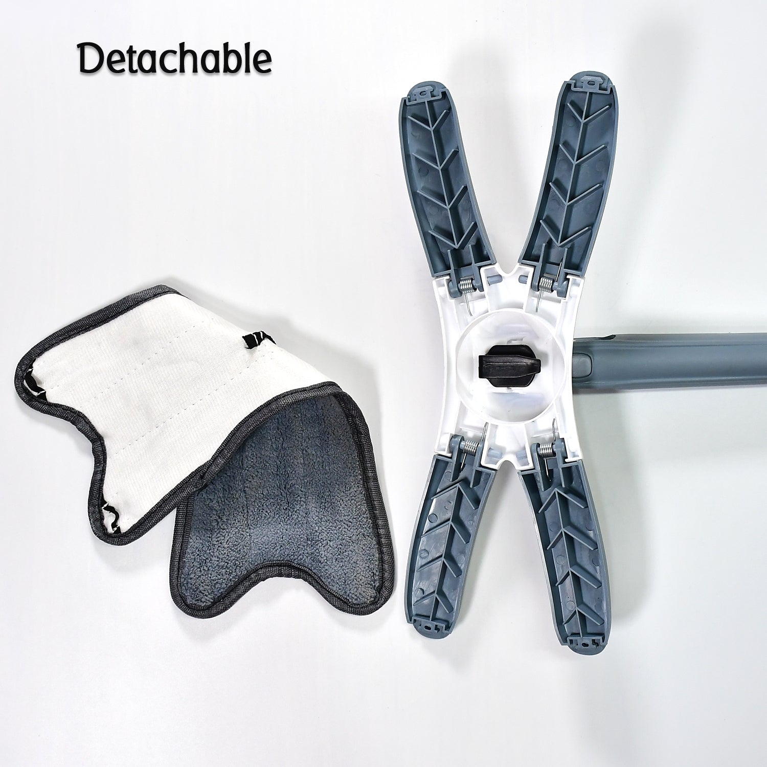 Detailed view of the X-shape flat mop head with a super-absorbent microfiber pad.