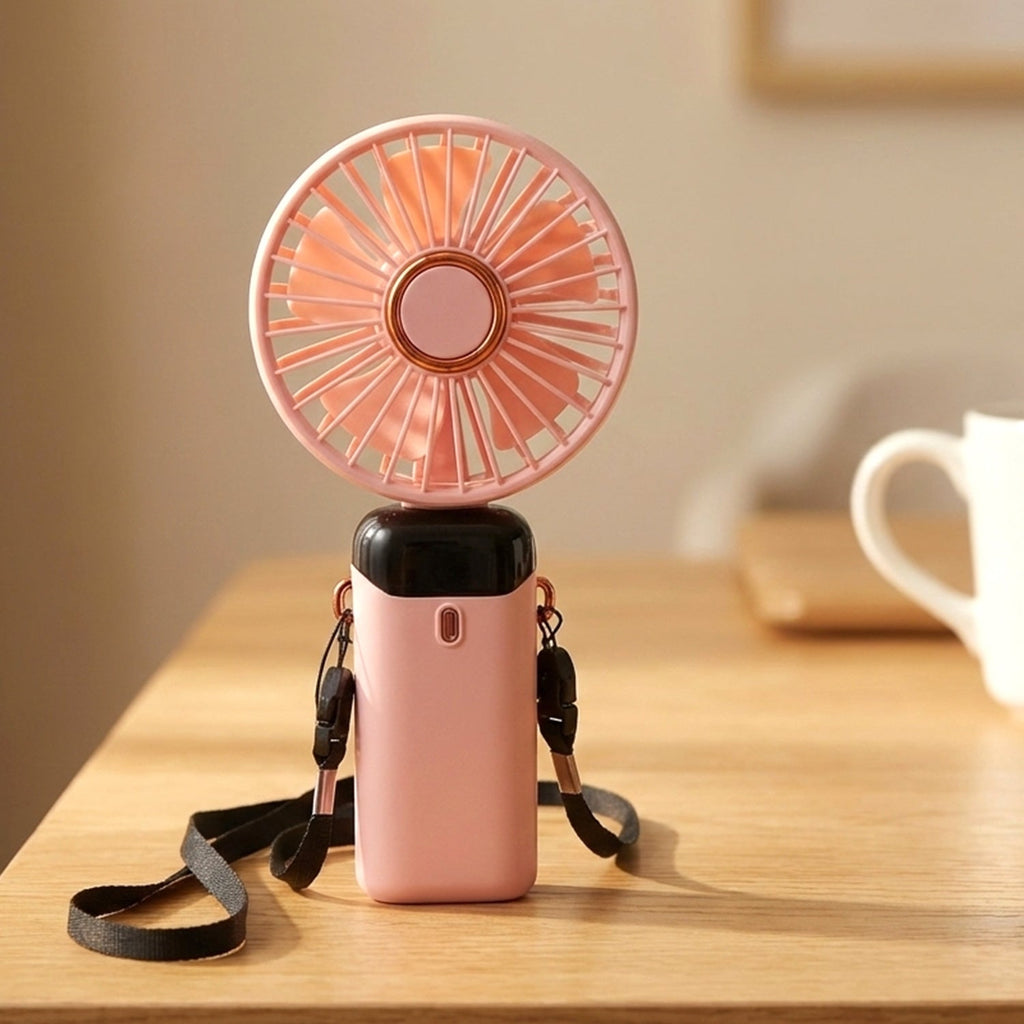 Rechargeable handheld cooling fan with stable stand for versatile use