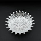 Multipurpose silver finish tray showcasing dry fruits, ideal for festive gatherings.