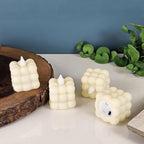 Stylish bubbled LED decorative candle glowing warmly indoors