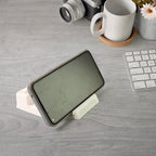 Closeup of plastic mobile phone stand with charging port