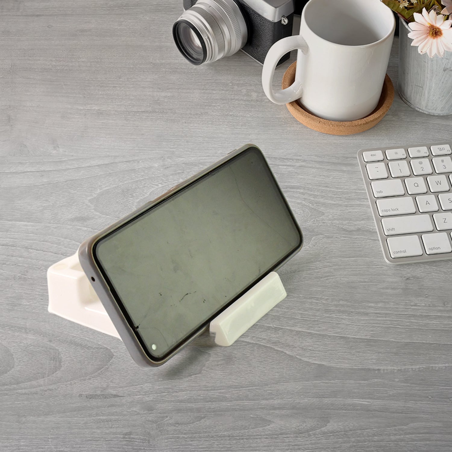 Closeup of plastic mobile phone stand with charging port