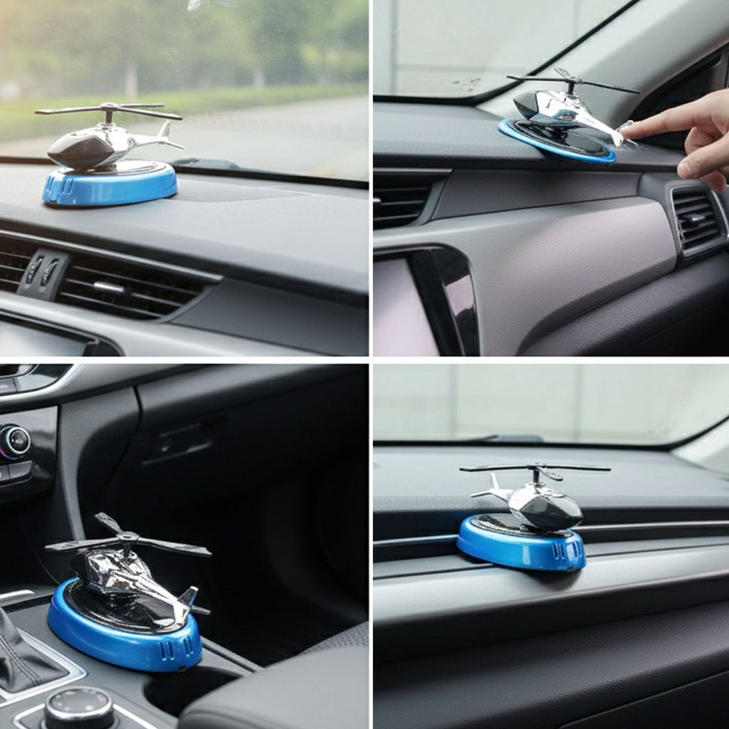 Rotating blade helicopter car air freshener placed on car dashboard