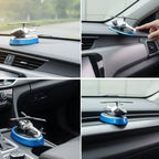 Rotating blade helicopter car air freshener placed on car dashboard