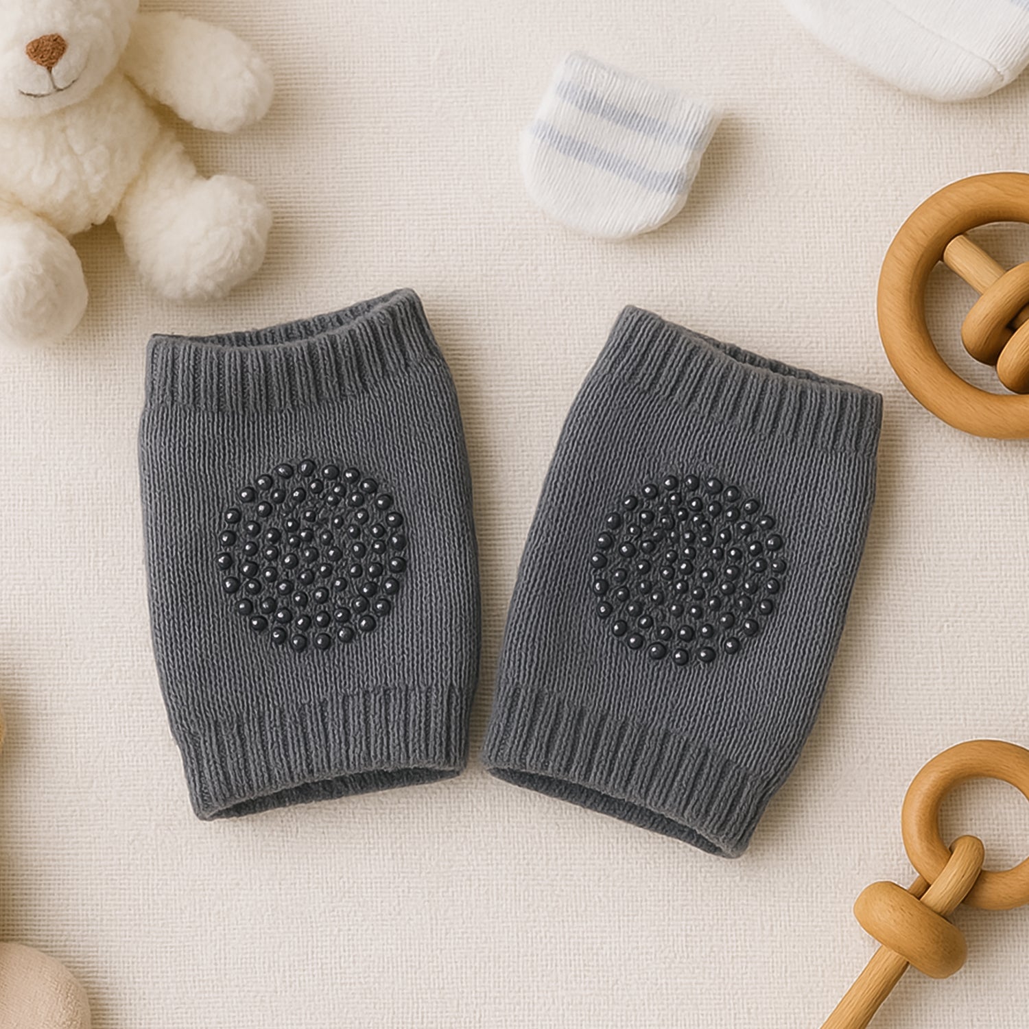 Dark grey wool knit toddler leg warmers providing knee protection