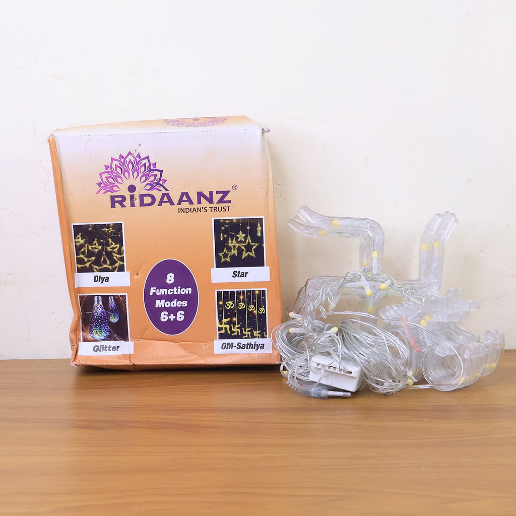 Swastik Om LED string lights glowing in a warm light, perfect for ambiance.