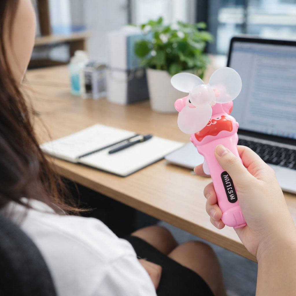 Compact handheld fan in fun cartoon style for kids and adults