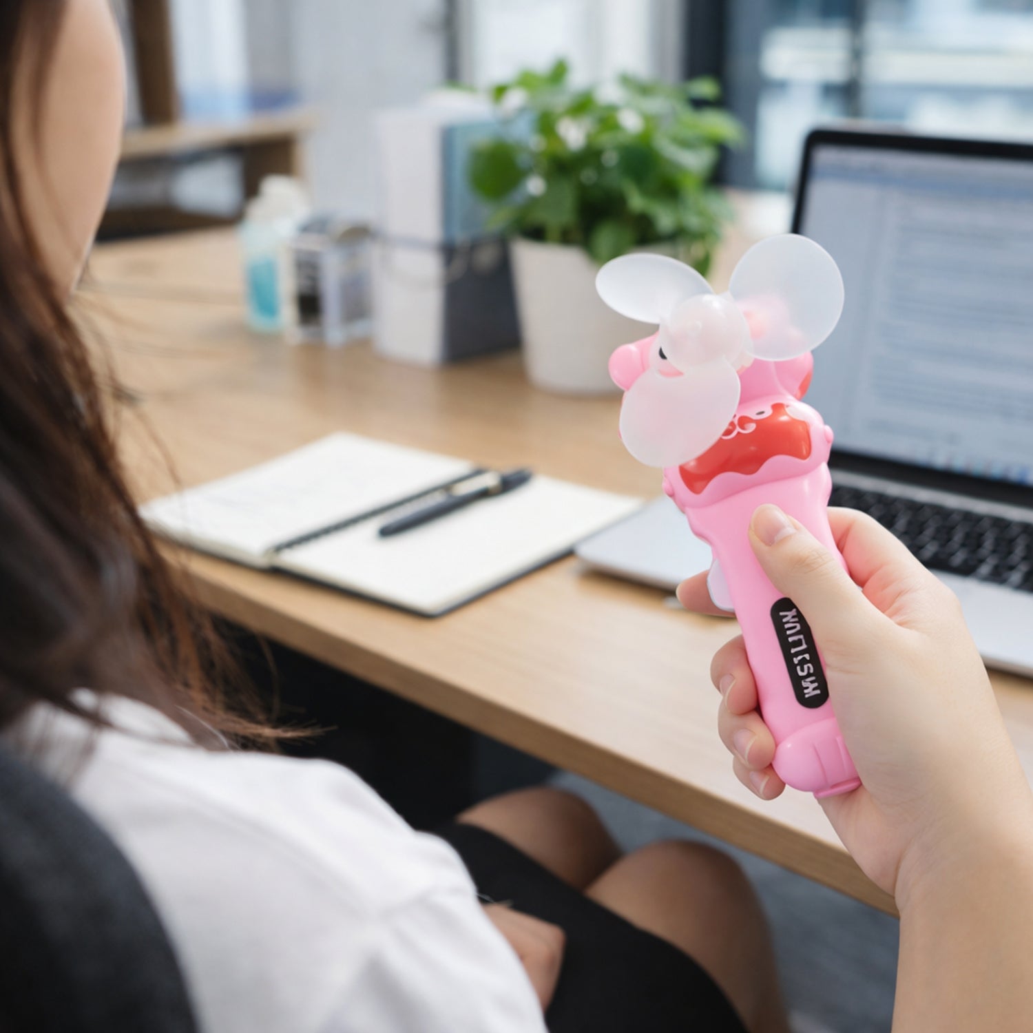 Compact handheld fan in fun cartoon style for kids and adults