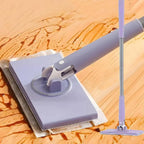 Close-up view of the ergonomic push-pull handle of the automatic mini mop.