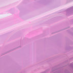 Hand adjusting the removable dividers in the versatile plastic organizer box.