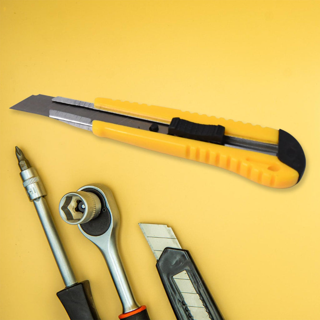 Set of 4 essential hand tools including screwdriver and cutter in protective case