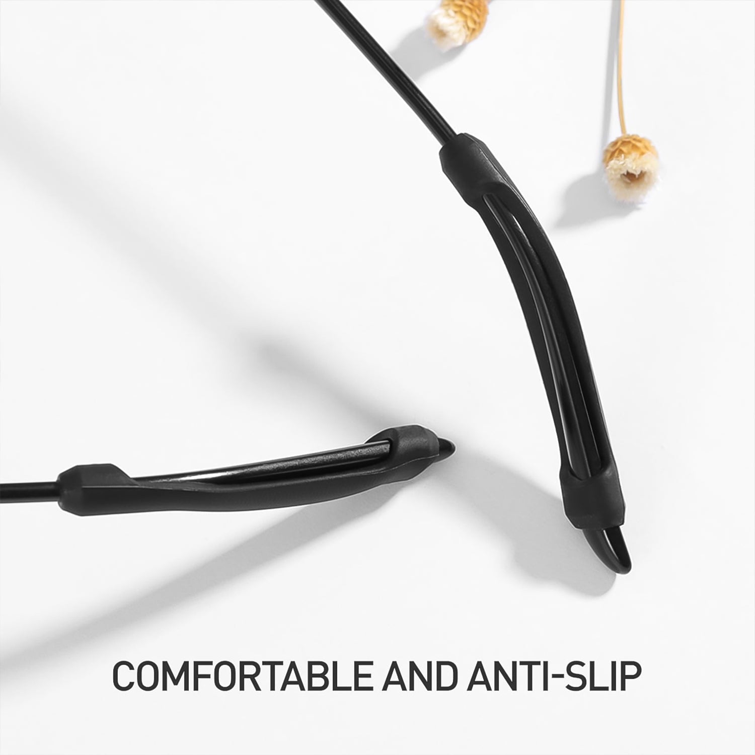Silicone ear grips ensuring a secure glasses fit on a model, seen from behind the ear.