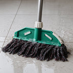 Cotton mop refill attached to sturdy rod for floor cleaning