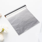 Thick aluminum foil roll, ideal for cooking and food storage.