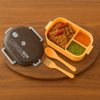 Reusable leak-proof food container with integrated spoon