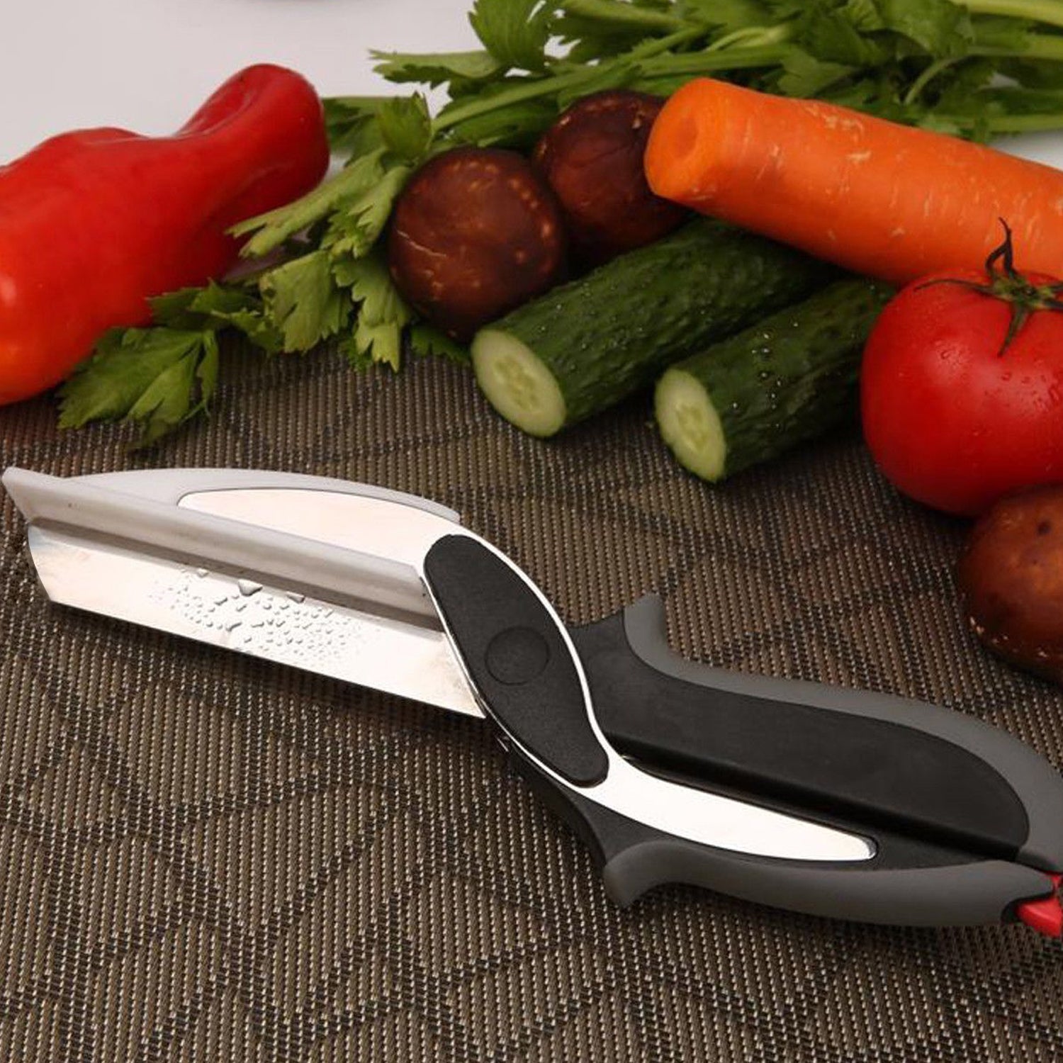 The 2-in-1 Food Chopper's safety latch and detachable blade for easy cleaning.